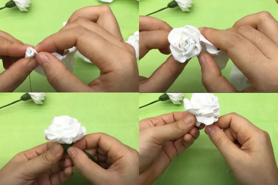 Cố định hoa vào thân kẽm bằng dây chỉ.