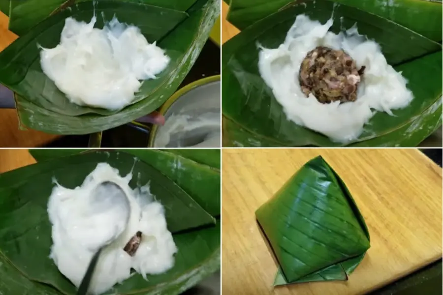Cho bột vào giữa
Lớp nhân thịt đặt ở trên
Lớp bột phủ lên
Bánh giò được gói hoàn chỉnh