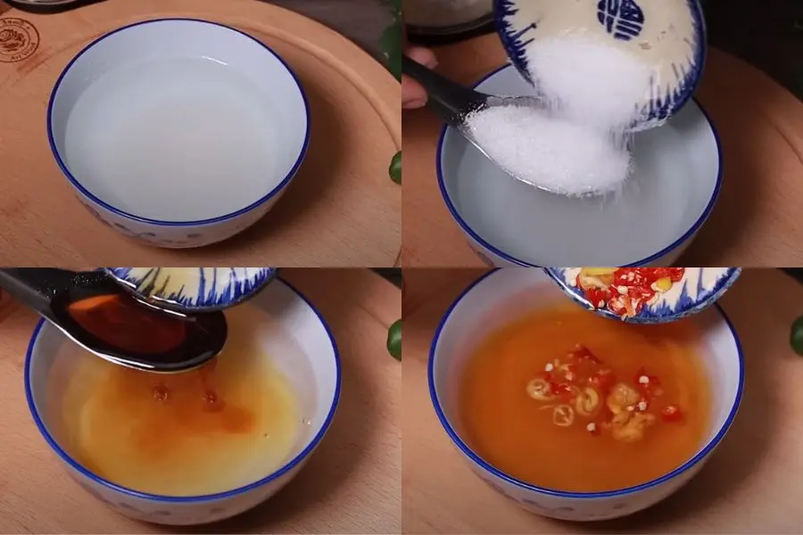 Cho 1 muỗng canh đường, 3 muỗng canh nước mắm khuấy đều cho đường tan.