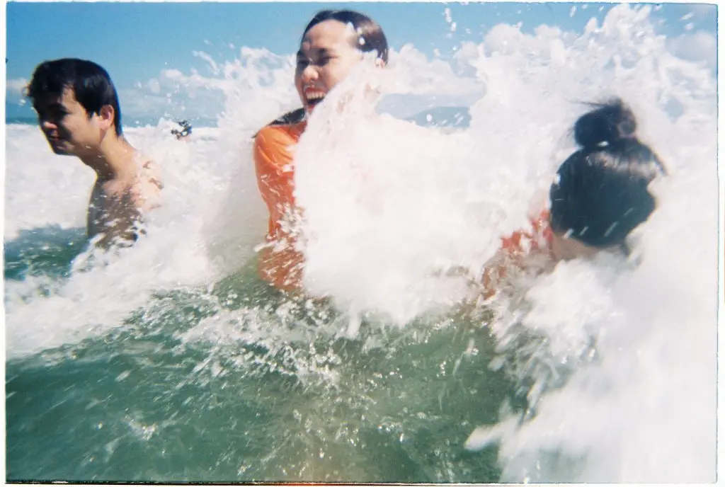 Swimming, playing volleyball and dipping into the clear water at Doc Let Beach
