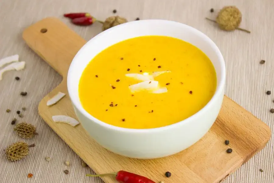 Cháo sữa bí đỏ hấp dẫn cho thực đơn ăn dặm truyền thống cho bé 6 tháng