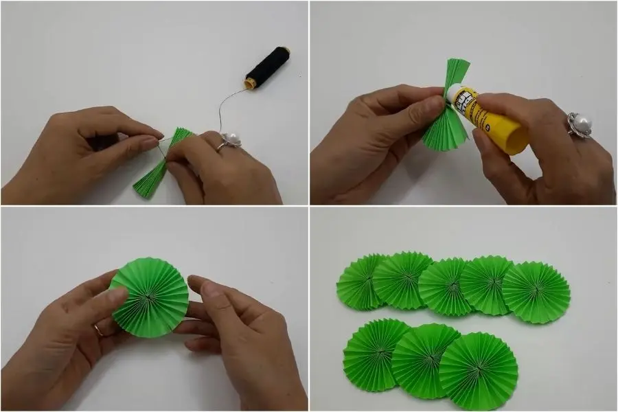 Dùng keo dán để cố định và tạo hình quạt tròn.