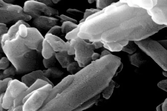 Silica dust under microscope. It is made up of tiny particles of crystalline silica