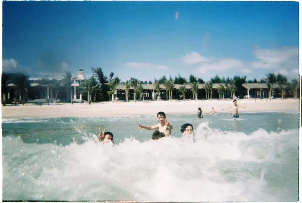 Swimming, playing volleyball and dipping into the clear water at Doc Let Beach