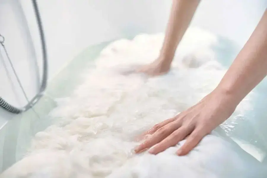 Ngâm thảm lông cừu