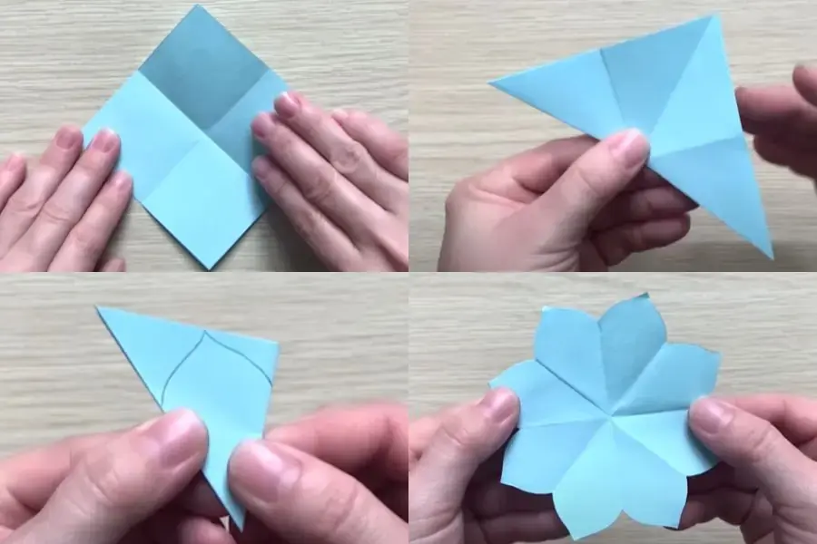 Gấp giấy theo nếp để khi vẽ sẽ cho ra thành quả bông hoa đẹp.