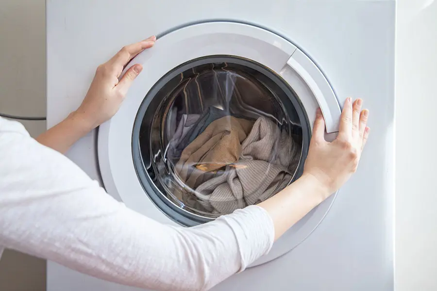 Đảm bảo cửa được đóng kín khi khởi động lại máy giặt.