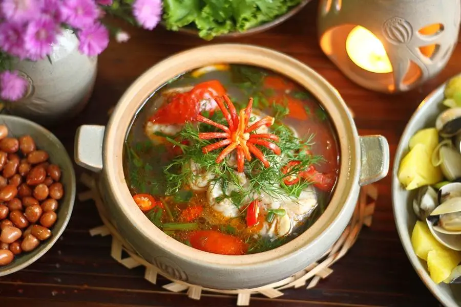 Món cá tra nấu canh chua bình dị và quen thuộc.