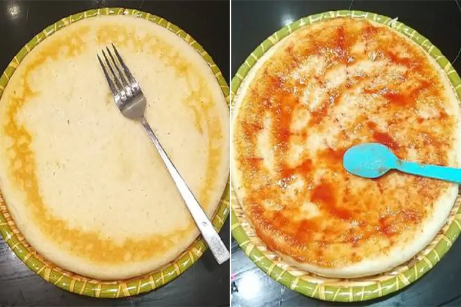Đế bánh pizza đã phết sốt cà chua.