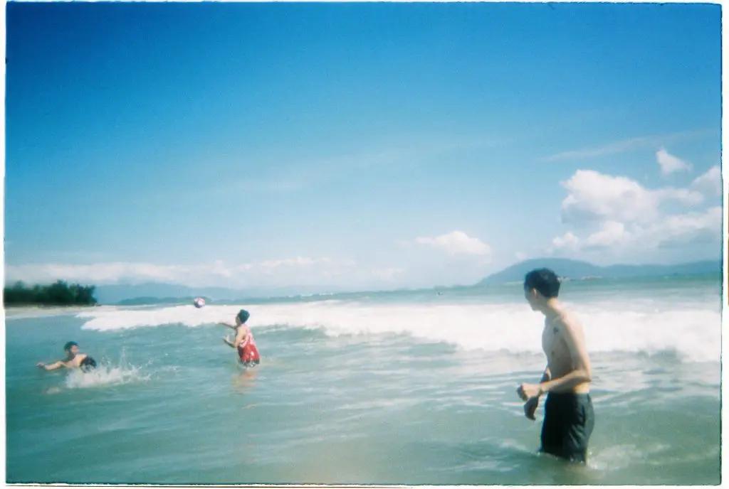 Swimming, playing volleyball and dipping into the clear water at Doc Let Beach