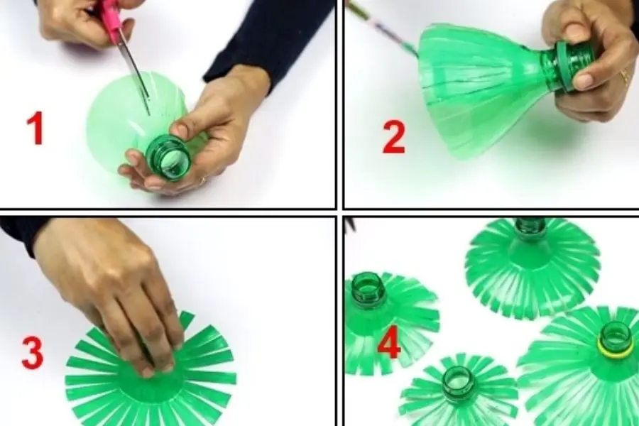 Cắt dọc những phần đầu chai nhựa làm tán lá cây thông.