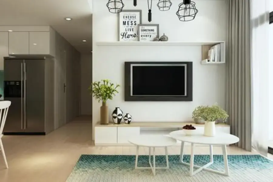 Bình hoa trang trí kệ tivi tạo cho không gian sự tươi tắn
