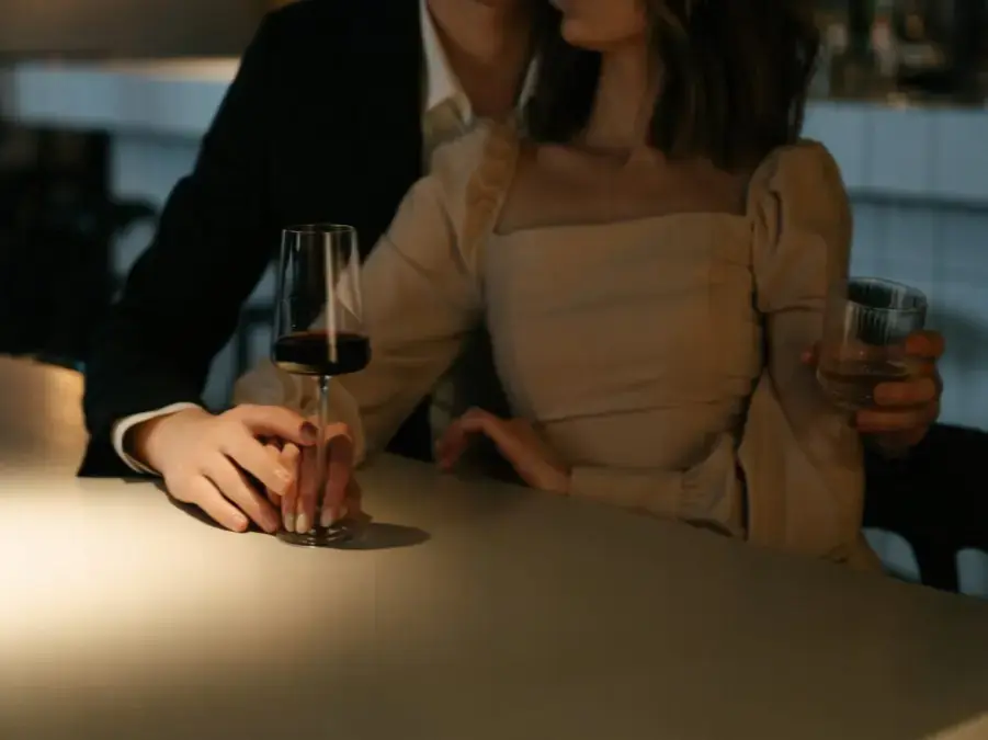 Couple sitting together at bar