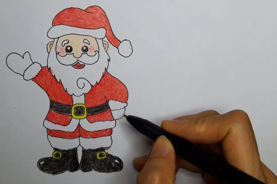 Tô màu Ông già Noel bằng màu sáp.