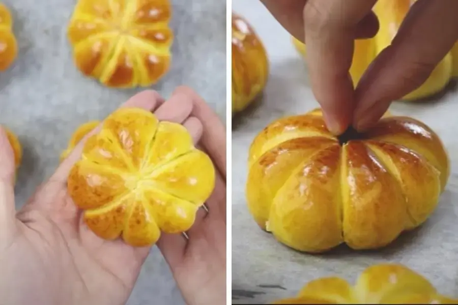 Trang trí bánh Halloween bí đỏ với nho khô ở chính giữa để làm cuống.