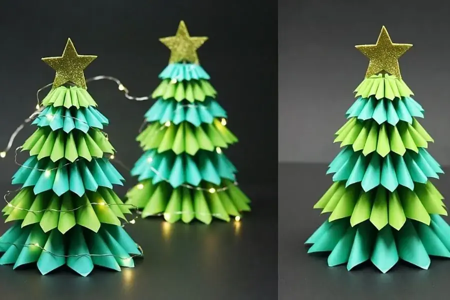 Cây thông Noel bằng giấy và dây đèn led sẽ làm phòng ngủ bạn lung linh mỗi đêm.