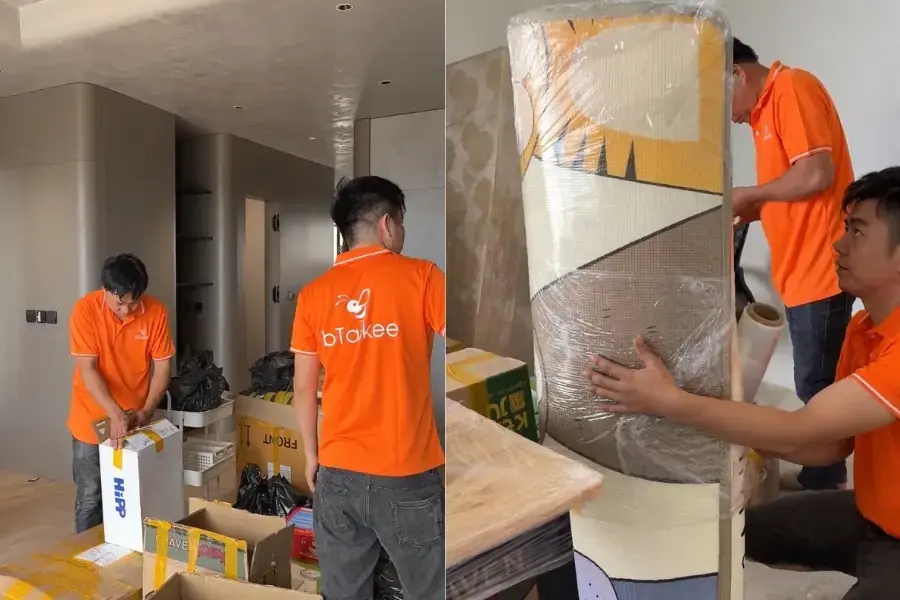 Nhân viên bọc hàng hóa bằng màng co PE chống thấm, xếp vào thùng theo phân loại. 
