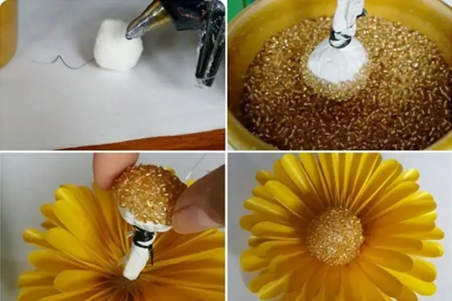 Sau khi nhúng hạt thủy tinh làm nhụy bạn luồn qua lỗ nhỏ ở giữa sao cho đẹp mắt. 
