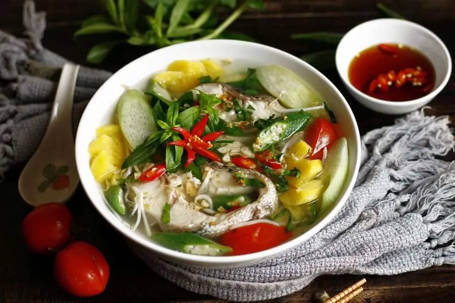 Canh chua cá lóc - món ăn ngày Tết chua thanh, ngọt bùi của cá hấp dẫn, không thể chối từ.